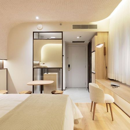 Qoya Hotel Curitiba, Curio Collection By Hilton 外观 照片 A room at the hotel