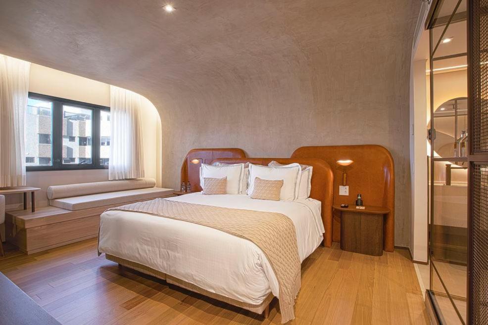Qoya Hotel Curitiba, Curio Collection By Hilton 外观 照片 A bedroom at the hotel
